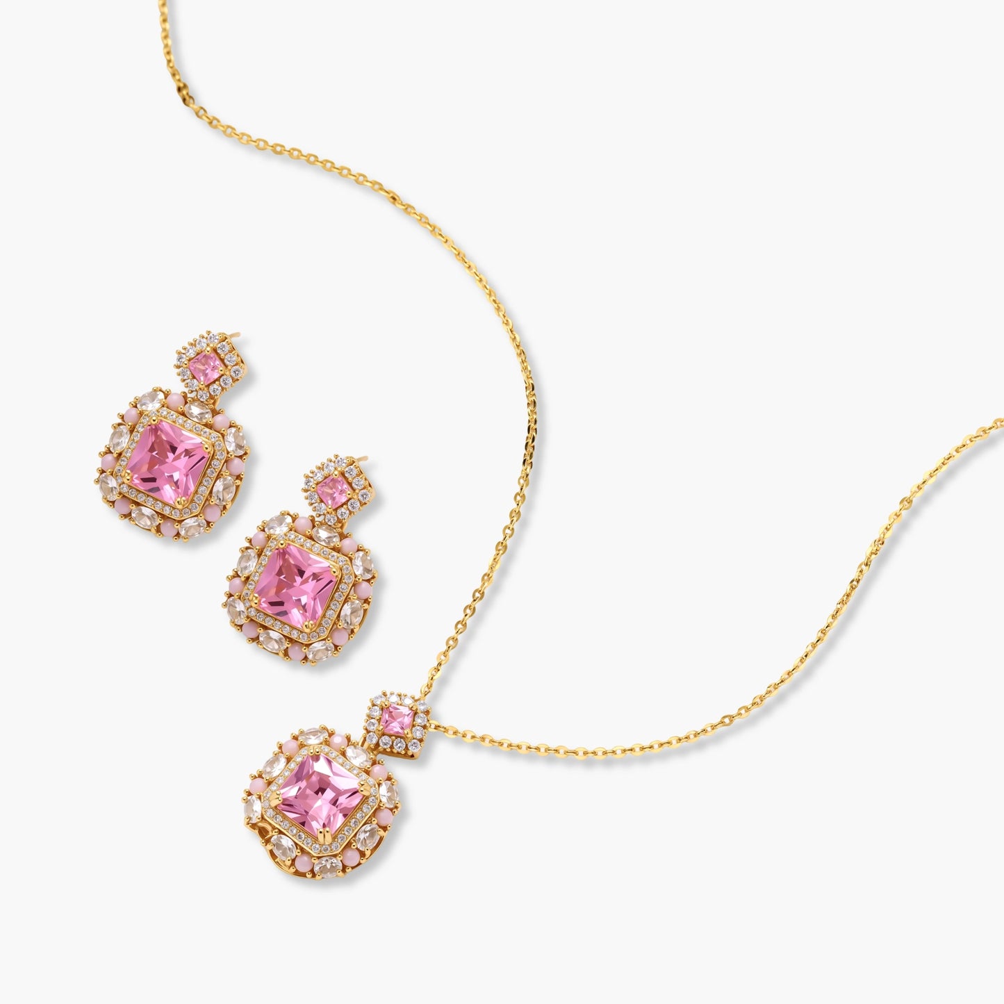 14K gold-plated jewelry set featuring square-cut cubic zirconia stones in ornate layered settings on white background.