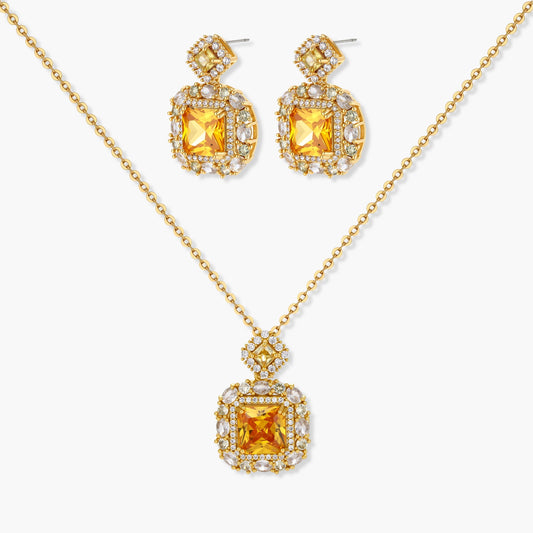 14K gold-plated jewelry set featuring square-cut cubic zirconia stones in ornate layered settings on white background.