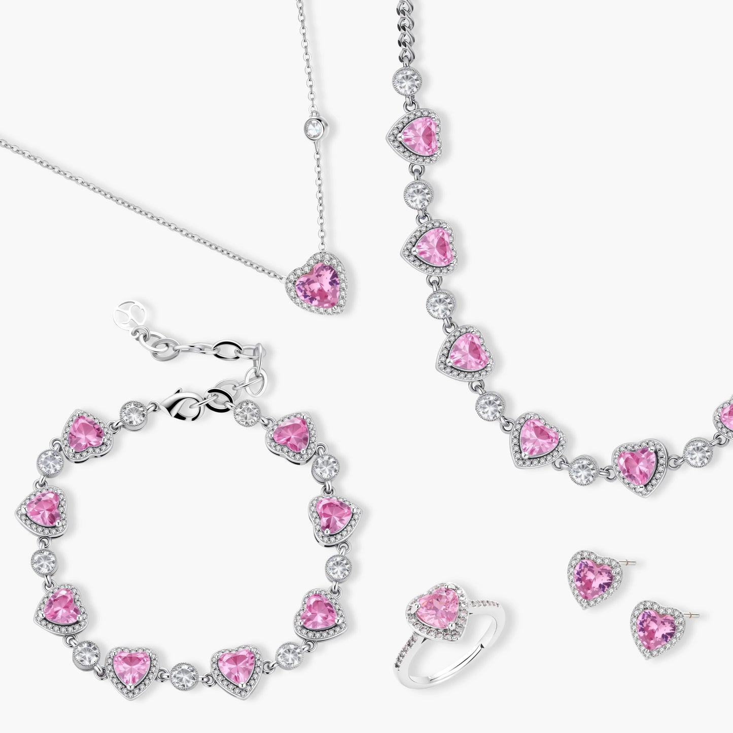 Pink heart-shaped cubic zirconia jewelry set with white gold plating featuring necklace, earrings, bracelet and ring