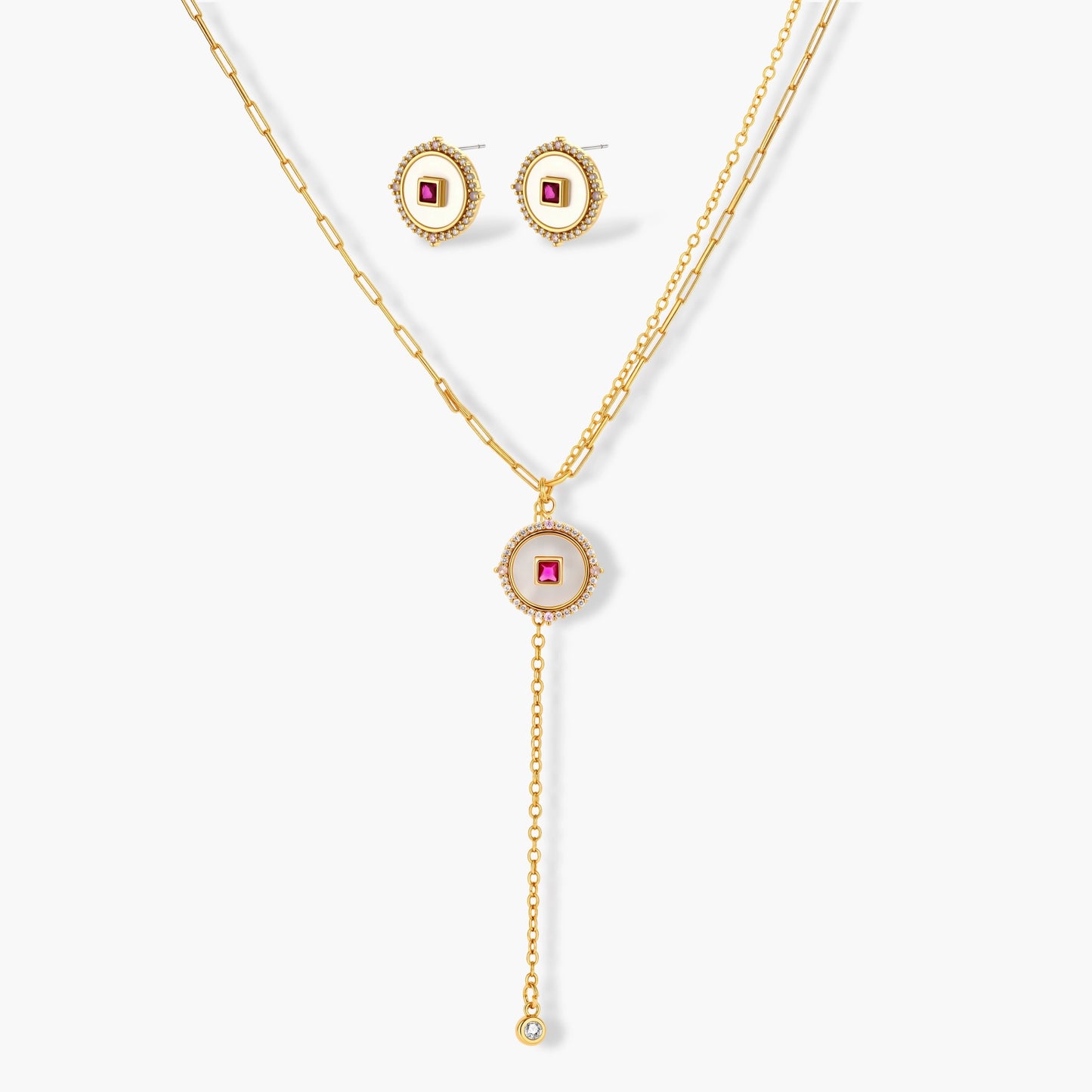 Gold-plated circular medallion necklace set with white enamel base and pink cubic zirconia accent stones