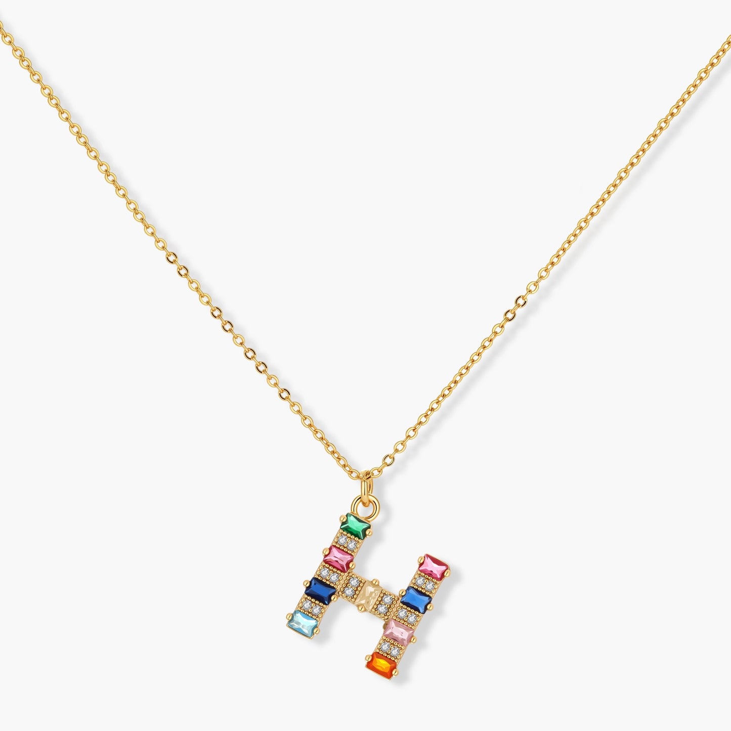 Letter H jewelry set featuring geometric crystal design in gold and white gold plated finish with adjustable chain necklace