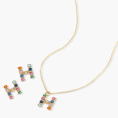 Letter H jewelry set featuring geometric crystal design in gold and white gold plated finish with adjustable chain necklace
