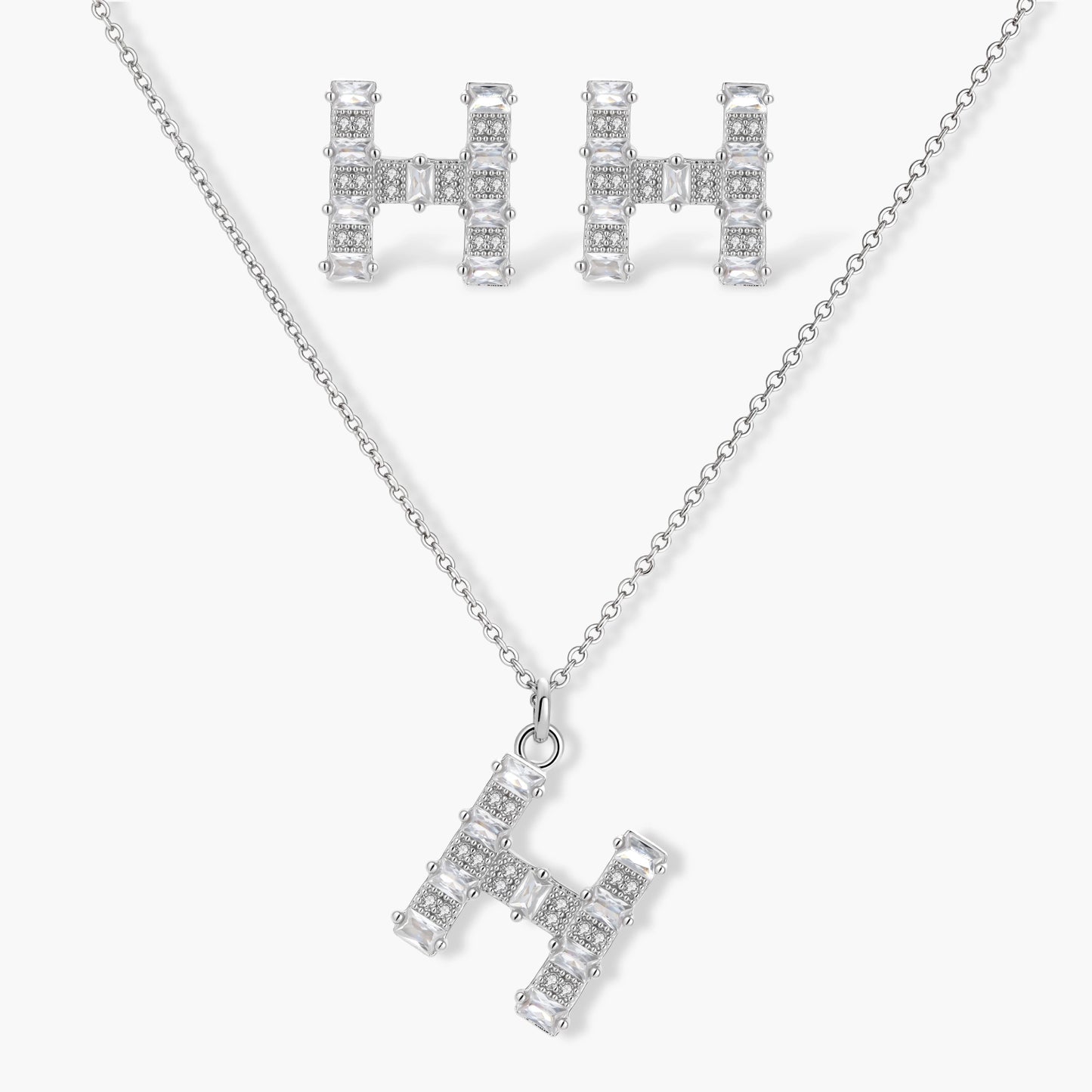 Letter H jewelry set featuring geometric crystal design in gold and white gold plated finish with adjustable chain necklace